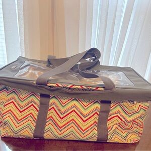 Brand new, never used. Thirty-one large bag with lid.